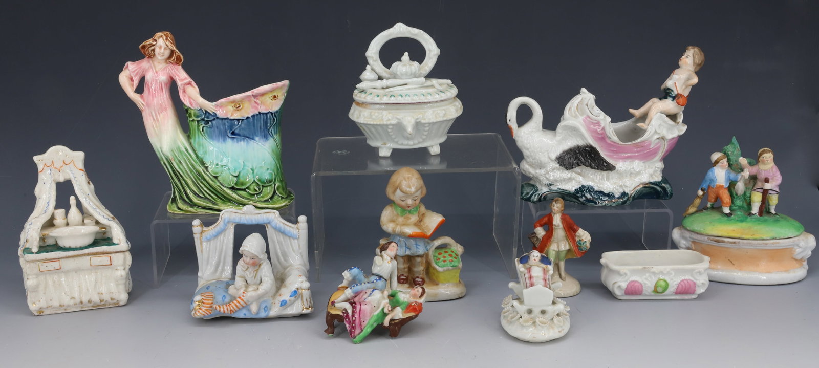 LOT OF PORCELAIN AND BISQUE FIGURES: INCLUDES; VASES, COVERED BOXES, AND FIGURES - LARGEST 5 1/2" H PLEASE READ CAREFULLY - Terms for Purchasing and Shipping of Auction Items. Please read carefully before bidding. All payments for purcha