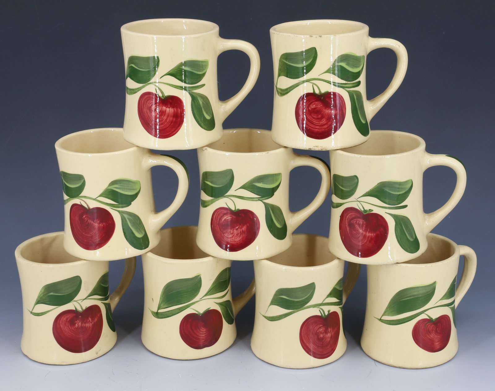 (9) WATT WARE APPLE MUGS: HANDLED MUGS, 3 3/4" H PLEASE READ CAREFULLY - Terms for Purchasing and Shipping of Auction Items. Please read carefully before bidding. All payments for purchases will be made through LiveAuctioneers