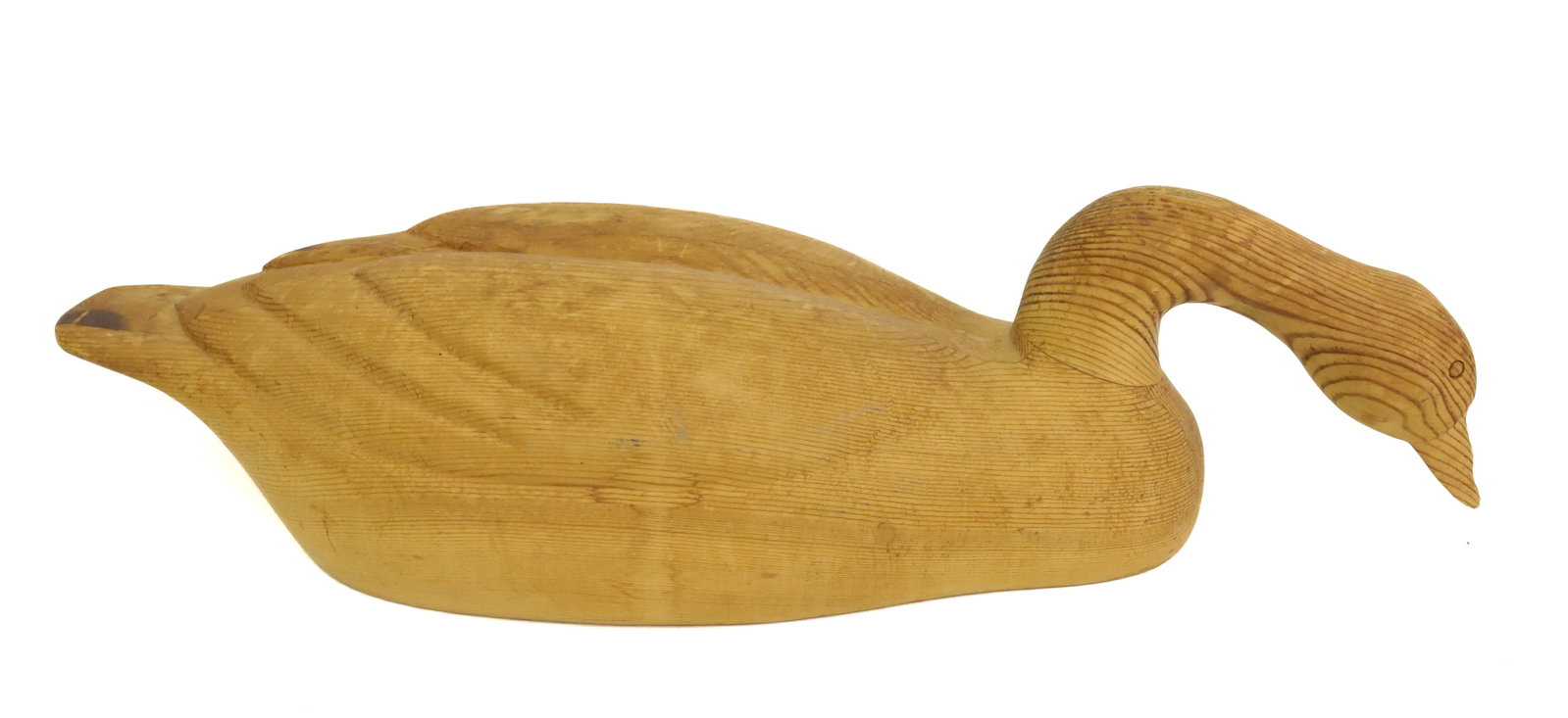 CARVED GOOSE DECOY: UNPAINTED. 29" L. PLEASE READ CAREFULLY - Terms for Purchasing and Shipping of Auction Items. Please read carefully before bidding. All payments for purchases will be made through LiveAuctioneers.com 