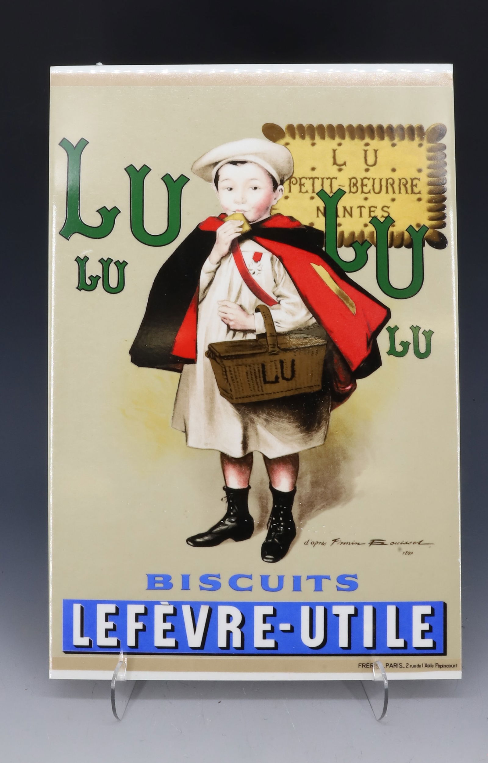 LU LU BISCUIT ADVERTISER: PRINTED ON TILE. MRKD. SEANO ON BACK. 17 3/4" X 12 3/4". PLEASE READ CAREFULLY - Terms for Purchasing and Shipping of Auction Items. Please read carefully before bidding. All payments for purchases wi