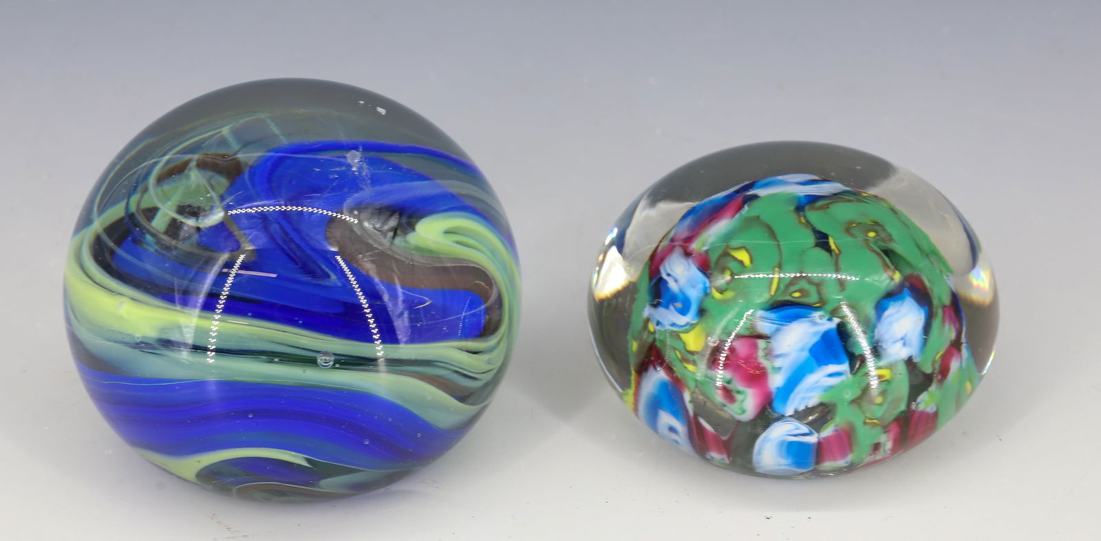 (2) ART GLASS PAPERWEIGHTS: MILROPA BLUE OPAQUE SWIRL AND MIXED CAINES UNSIGNED 1 3/4"H,2 3/4"H PLEASE READ CAREFULLY - Terms for Purchasing and Shipping of Auction Items. Please read carefully before bidding. All payments for p