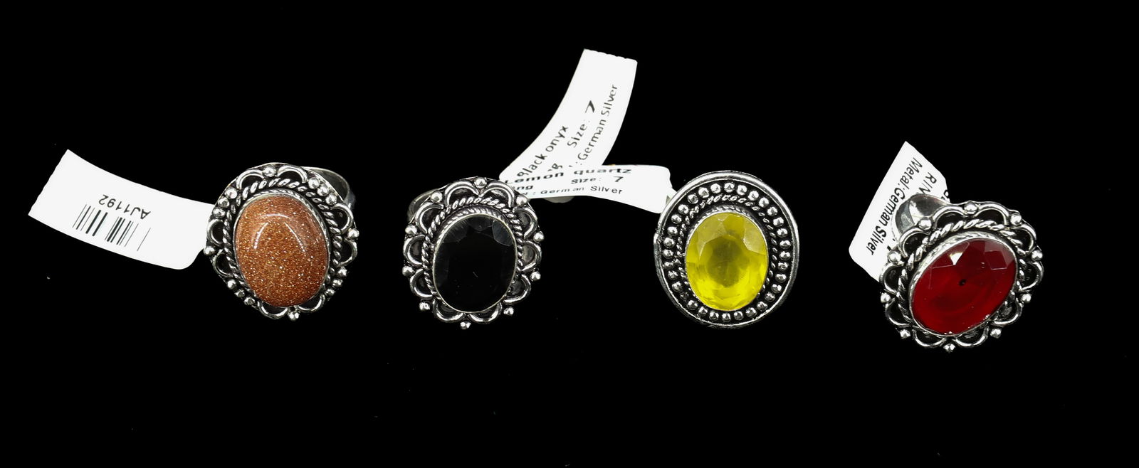 (4) SEMI PRECIOUS STONE JEWELRY: THREE RINGS SIZE 7 ROSE QUARTZ, BLACK ONYX AND LEMON QUARTZ ONE RING SIZE 9 RED SUN STONE PLEASE READ CAREFULLY - Terms for Purchasing and Shipping of Auction Items. Please read carefully before biddi