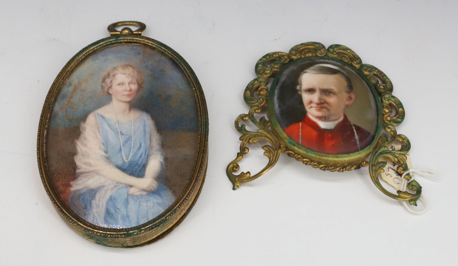 (2) PAINTED MINIATURE PORTRAITS: RELIGIOUS CARDINAL OR PRIEST PAINTED ON PORCELAIN WITH BRASS FRAME AND PORTRAIT OF A WOMAN PAINTED ON FRENCH IVORY 3"H,4 1/2"H PLEASE READ CAREFULLY - Terms for Purchasing and Shipping of Auction Item