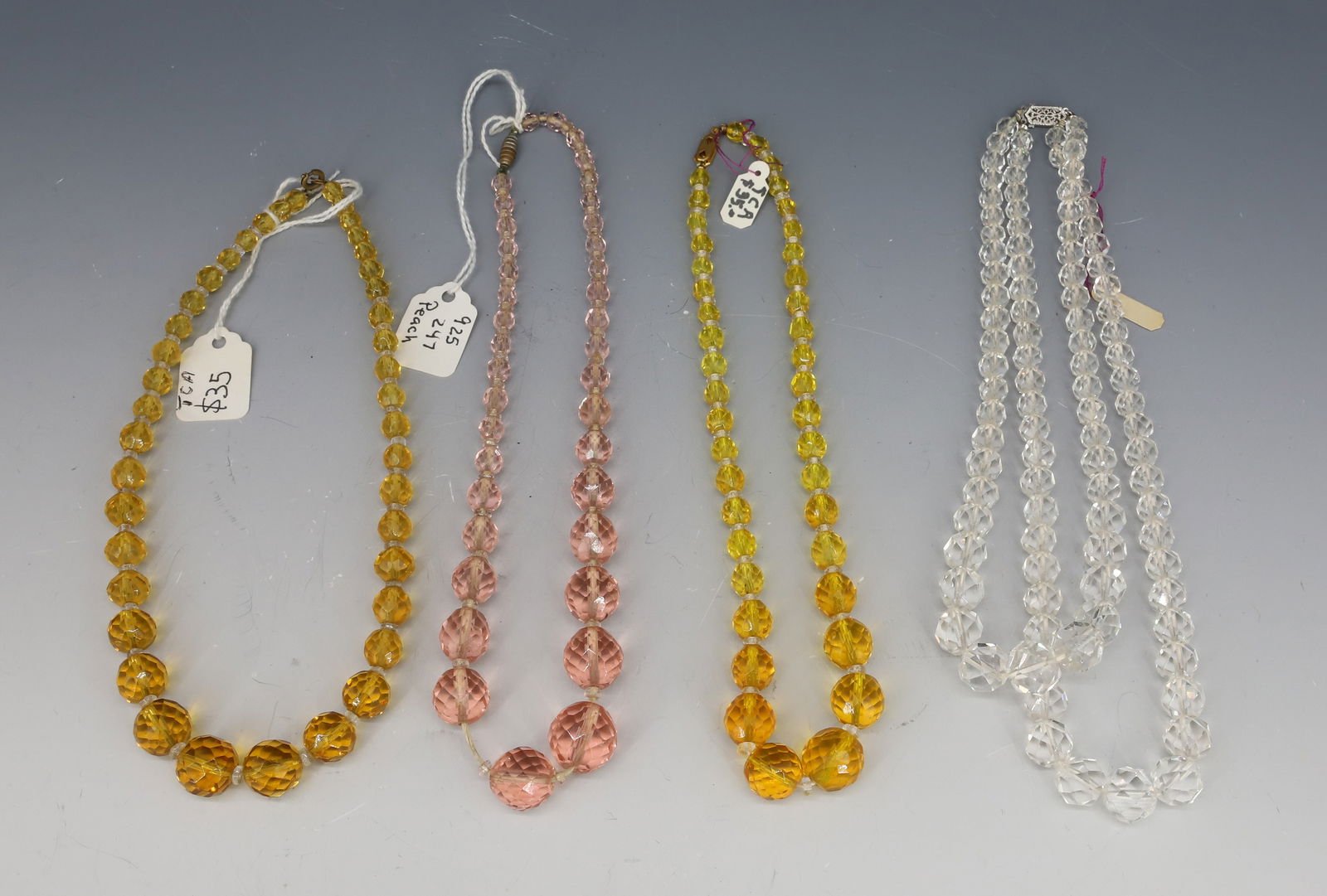 (4) CZECH CUT GLASS BEAD STRANDS: TWO AMBER, ONE PINK AND DOUBLE STRAND CLEAR GLASS 15"/16"L PLEASE READ CAREFULLY - Terms for Purchasing and Shipping of Auction Items. Please read carefully before bidding. All payments for purchases