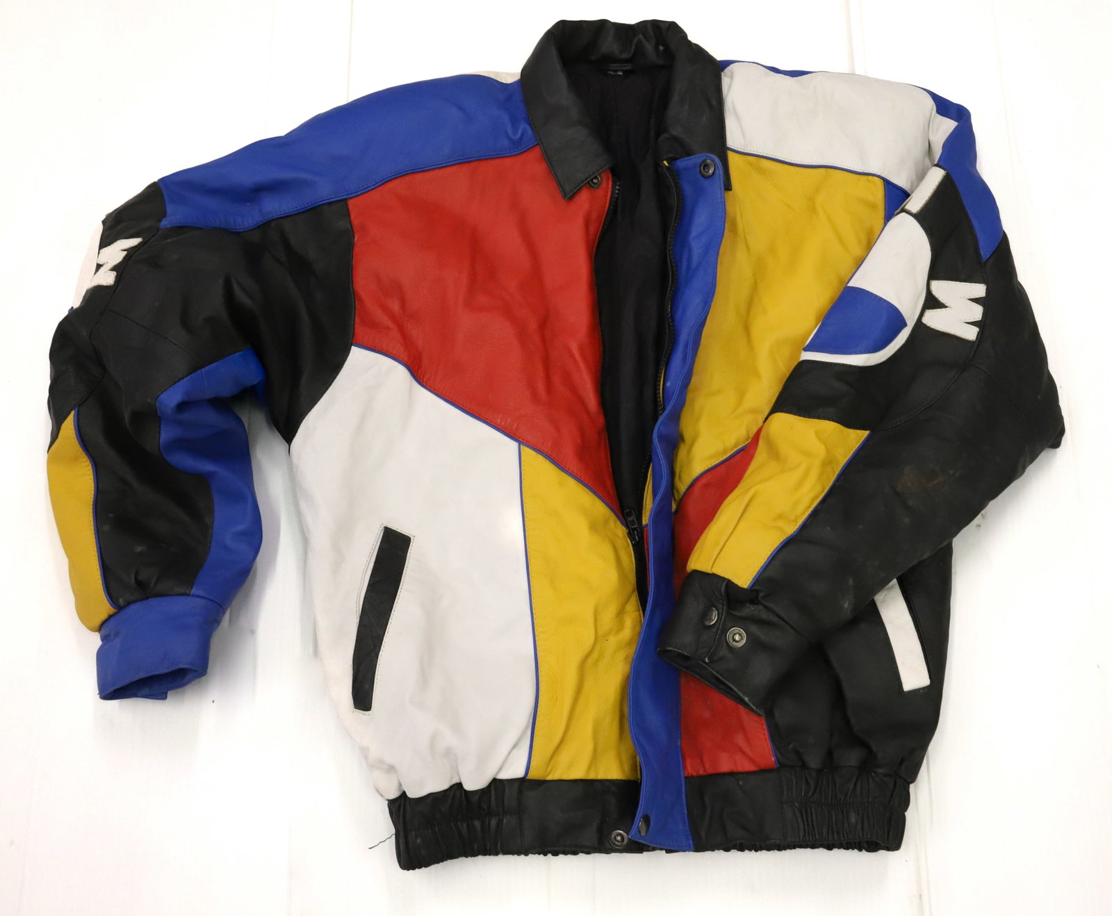 LOT OF VINTAGE CLOTHING: INCLUDING; RED WOOL JACKET, DENIM SKIRT, LEATHER BMW JACKET, HATS, BAGS, AND MORE PLEASE READ CAREFULLY - Terms for Purchasing and Shipping of Auction Items. Please read carefully before bidding. All 