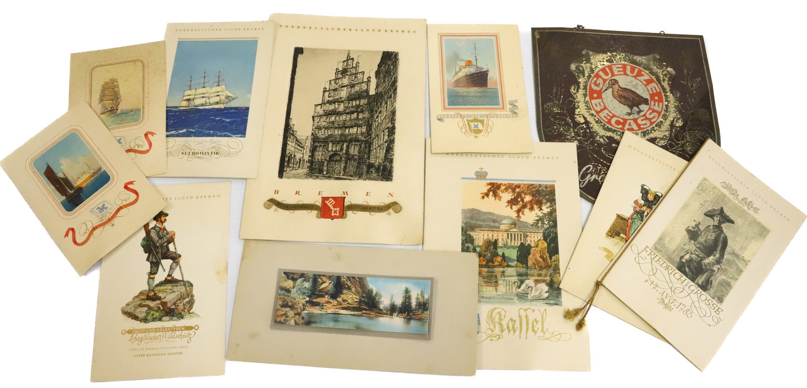 LOT OF 1930'S SHIP MENUS: GERMAN MENUS FROM THE S.S. BREMEN - (9) TOTAL MENUS WITH TIN LITHO ADVERTISING SIGN (10 1/4" X 9 3/4") PLEASE READ CAREFULLY - Terms for Purchasing and Shipping of Auction Items. Please read carefully