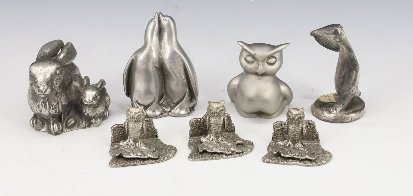 LOT OF MINIATURE PEWTER ANIMALS: INCLUDING: TWO PENGUINS (TALLEST 1 3/4"), RABBITS, OWL, (3) MINIATURE OWLS MRKD. 1975 METZKE. PLEASE READ CAREFULLY - Terms for Purchasing and Shipping of Auction Items. Please read carefully before b