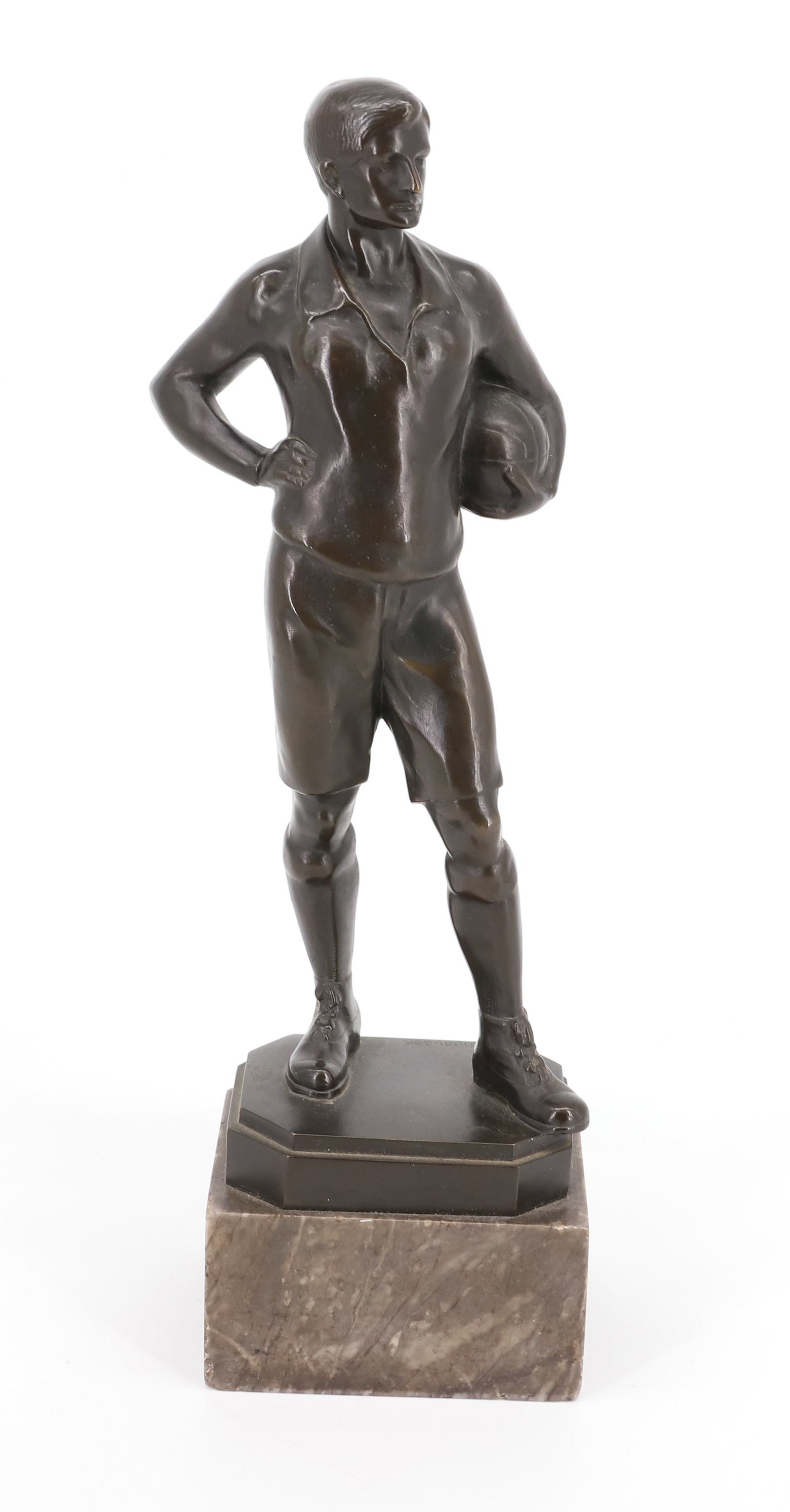 RICHARD GEORGE SCHNAUDER BRONZE SCULPTURE: FIGURE OF A YOUNG SOCCER (FOOTBALL) PLAYER STANDING WITH HAND ON HIP AND BALL UNDER ARM. SGND. R. SCHNAUDER ON TOP BACK BASE. MARBLE PLINTH. TOTAL HEIGHT 13 3/4". PLEASE READ CAREFULLY - Terms for Pur