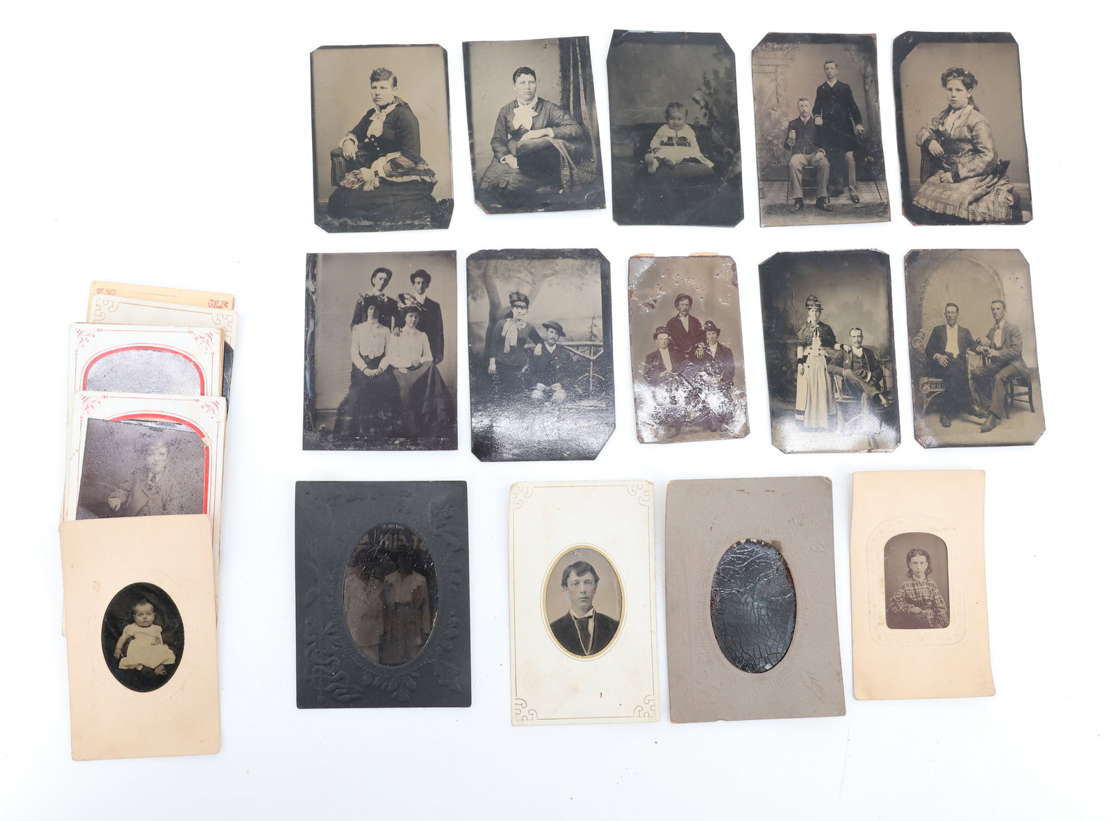 LOT OF TIN TYPES: MEN, WOMEN, AND CHILDREN (20 PLUS) IMAGES - AVERAGE SIZE 3 1/2" X 2 1/4" PLEASE READ CAREFULLY - Terms for Purchasing and Shipping of Auction Items. Please read carefully before bidding. All payments 