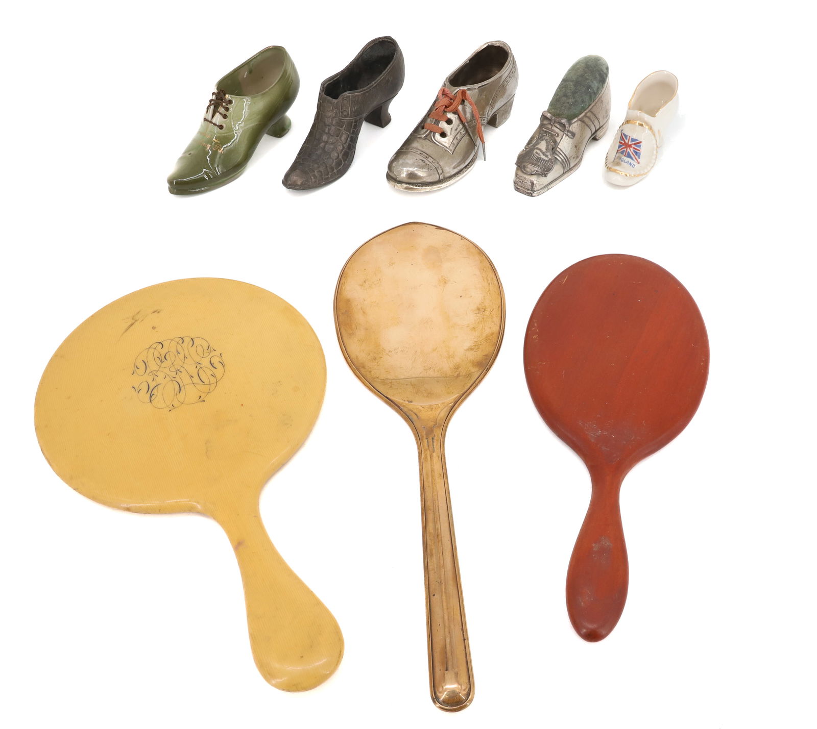 LOT OF VINTAGE MIRRORS AND SOUVENIR SHOES: (3) BEVELED GLASS HAND MIRRORS, LARGEST 13" - WITH (5) VARIOUS HEELED SHOES IN PORCELAIN, PIN CUSHION, AND OTHERS (LARGEST 6") PLEASE READ CAREFULLY - Terms for Purchasing and Shipping of Auction Item