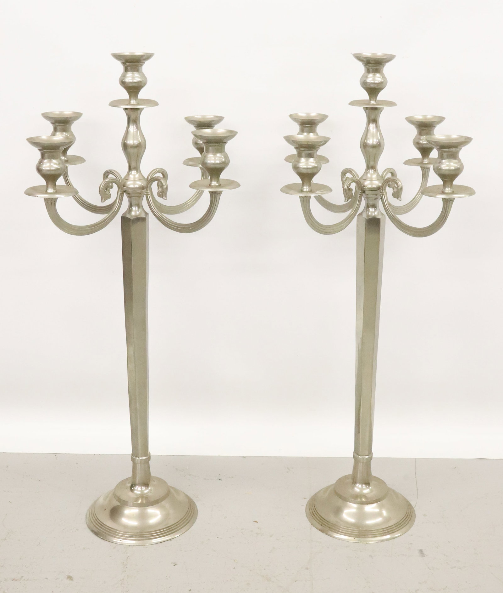 PAIR OF LARGE CANDELABRAS: TWO MATCHING CONTEMPORARY CANDLE HOLDERS 38 1/2" H. PLEASE READ CAREFULLY - Terms for Purchasing and Shipping of Auction Items. Please read carefully before bidding. All payments for purchases will be