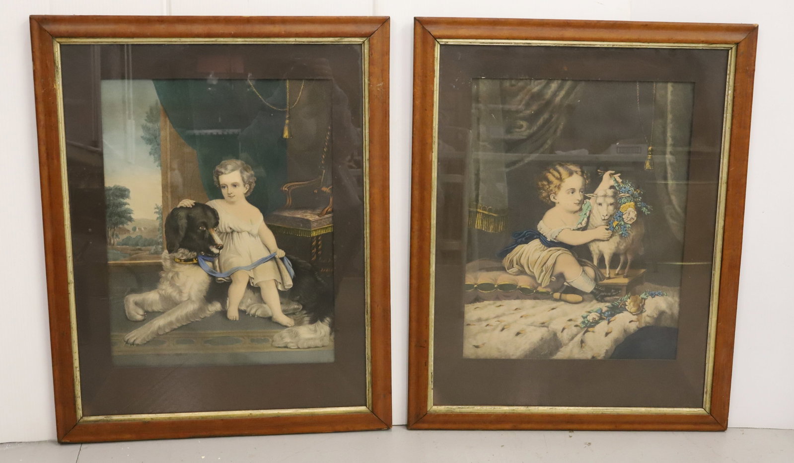 PAIR OF FRAMED PRINTS: VINTAGE PRINTS DEPICTING CHILD WITH DOG (FIDELITY STICKER ON BACK) AND CHILD WITH LAMB. MATCHING FRAMES AND MATTING. TOTAL SIZE 30 1/2" X 24 1/4". PLEASE READ CAREFULLY - Terms for Purchasing and Ship