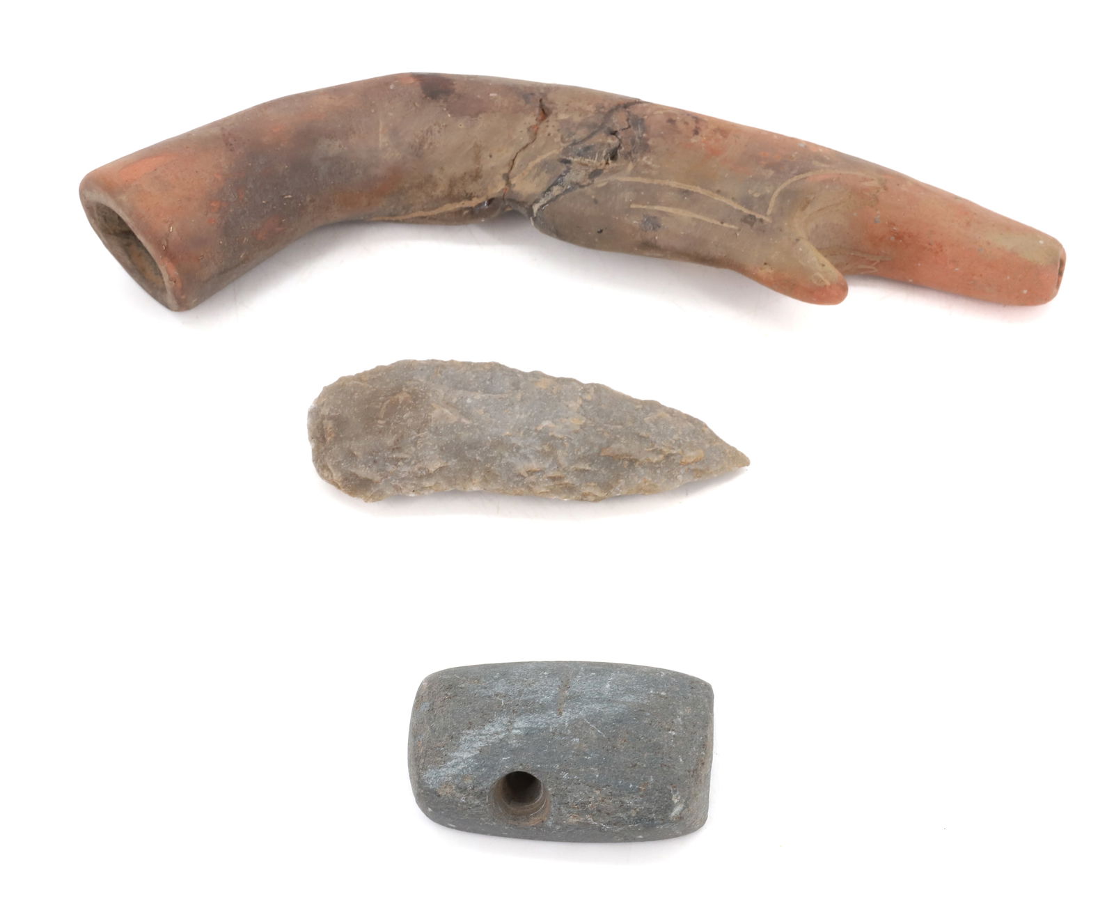 LOT OF NATIVE AMERICAN ARTIFACTS: INCLUDING: CLAY PIPE RESEMBLING ANTLER (TAGGED OHIO PIPE, 3/4/73) 8" L. ARROWHEAD POINT 3 1/2" L. WITH, CARVED SLATE PARTIAL ARTIFACT PLEASE READ CAREFULLY BEFORE BIDDING. ALL PAYMENTS MUST BE MADE BE