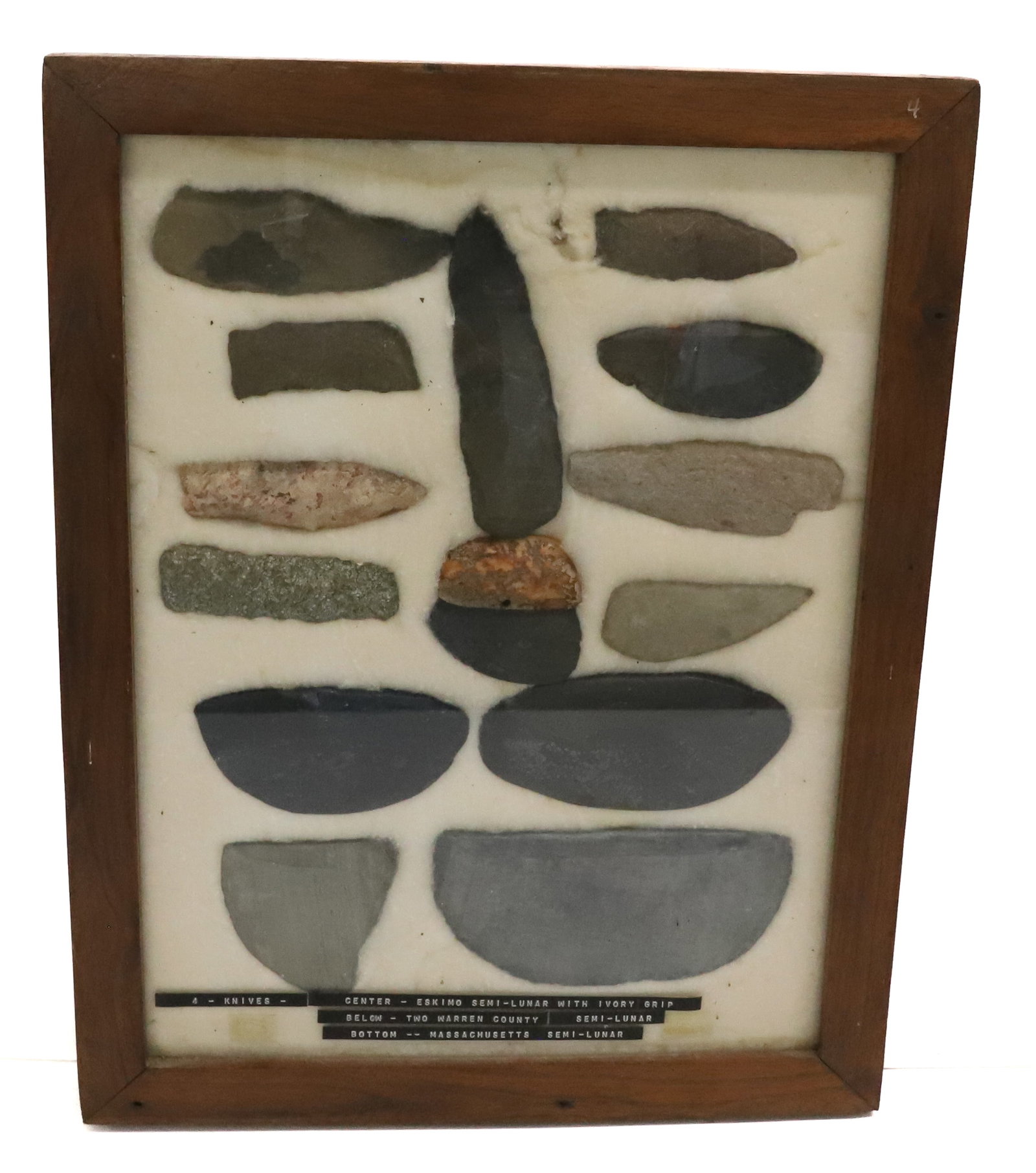 FRAMED COLLECTION OF STONE KNIVES: IDENTIFIED AS ESKIMO, WARREN COUNTY, NJ AND MASSACHUSETTS. LARGEST 5 3/4" L. PLEASE READ CAREFULLY BEFORE BIDDING. ALL PAYMENTS MUST BE MADE BEFORE ITEMS CAN BE SHIPPED. BUYERS CAN PAY VIA LIVE AUCTIO