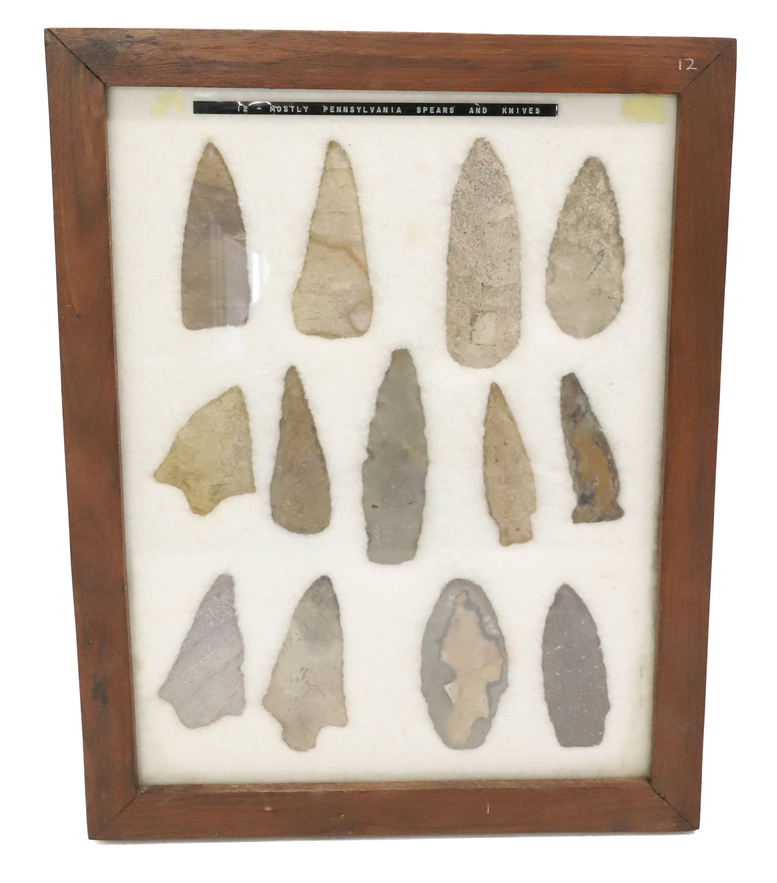FRAMED COLLECTION OF NATIVE AMERICAN ARTIFACTS: STONE SPEARS AND KNIVES. IDENTIFIED AS PENNSYLVANIA. LARGEST 4 3/4" L PLEASE READ CAREFULLY BEFORE BIDDING. ALL PAYMENTS MUST BE MADE BEFORE ITEMS CAN BE SHIPPED. BUYERS CAN PAY VIA LIVE AUCTIONEERS P