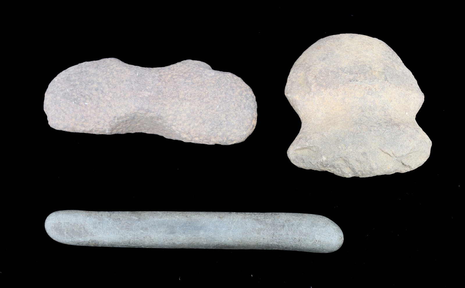 LOT OF (3) NATIVE AMERICAN ARTIFACTS: GROOVED AXE HEAD 3 3/4" L. LONGEST IS 6 7/8" L. PLEASE READ CAREFULLY BEFORE BIDDING. ALL PAYMENTS MUST BE MADE BEFORE ITEMS CAN BE SHIPPED. BUYERS CAN PAY VIA LIVE AUCTIONEERS PAYMENT CENTER IF HAVIN