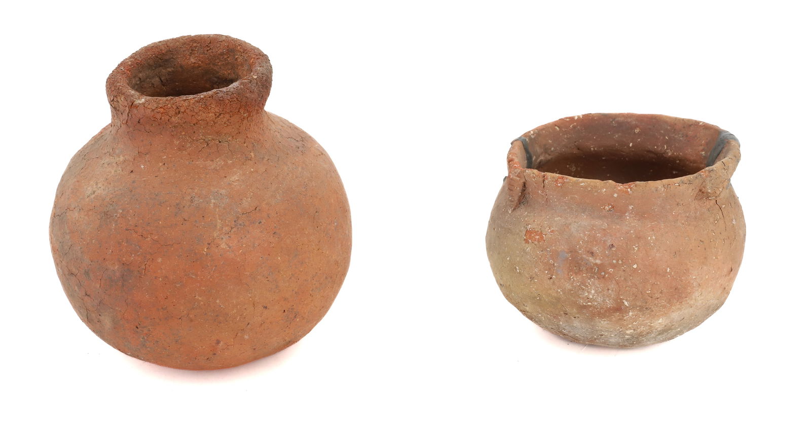 (2) POTTERY VESSELS: ORANGE CLAY. SMALLER POT HAS DECORATIVE ELEMENTS AROUND TOP EDGE 3 1/4" X 4 1/2". TALLER IS 5" H. PLEASE READ CAREFULLY BEFORE BIDDING. ALL PAYMENTS MUST BE MADE BEFORE ITEMS CAN BE SHIPPED. BUYERS CA