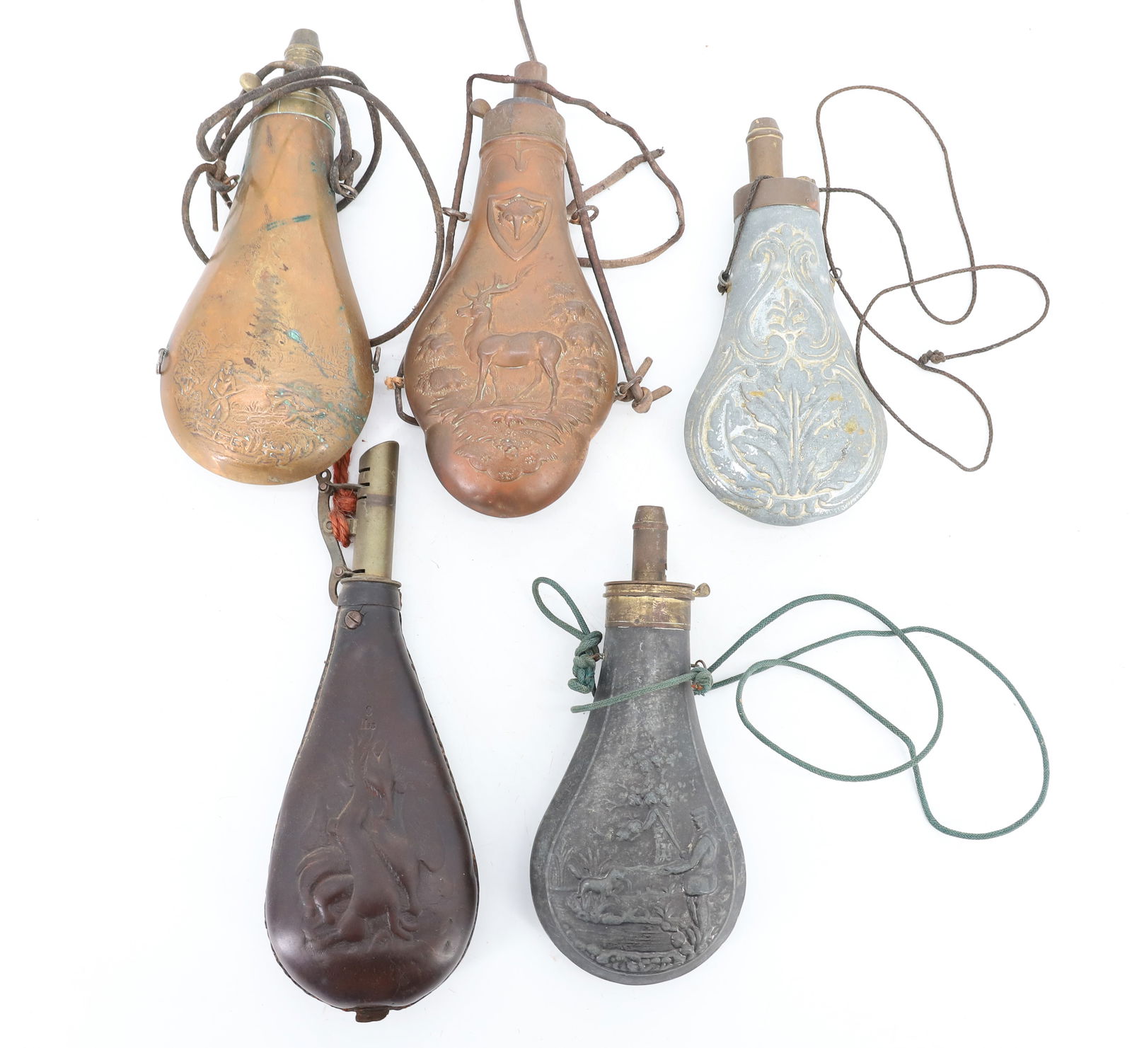 LOT OF (5) POWDER FLASKS: COPPER, METAL AND LEATHER. HUNTING SCENES, DEER AND GAME. LONGEST TOTAL LENGTH 8 1/2". PLEASE READ CAREFULLY BEFORE BIDDING. ALL PAYMENTS MUST BE MADE BEFORE ITEMS CAN BE SHIPPED. BUYERS CAN PAY VIA L