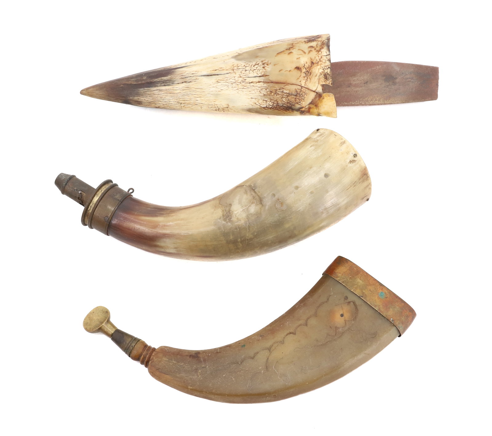 (2) POWDER HORNS AND WHETSTONE HOLDER: FLAT HORN HAS WHALE AND PIRATE DECORATION WITH BRASS ENDS TOTAL SIZE 9" L. WHETSTONE HOLDER 8 1/2" L. PLEASE READ CAREFULLY BEFORE BIDDING. ALL PAYMENTS MUST BE MADE BEFORE ITEMS CAN BE SHIPPED. BUYER