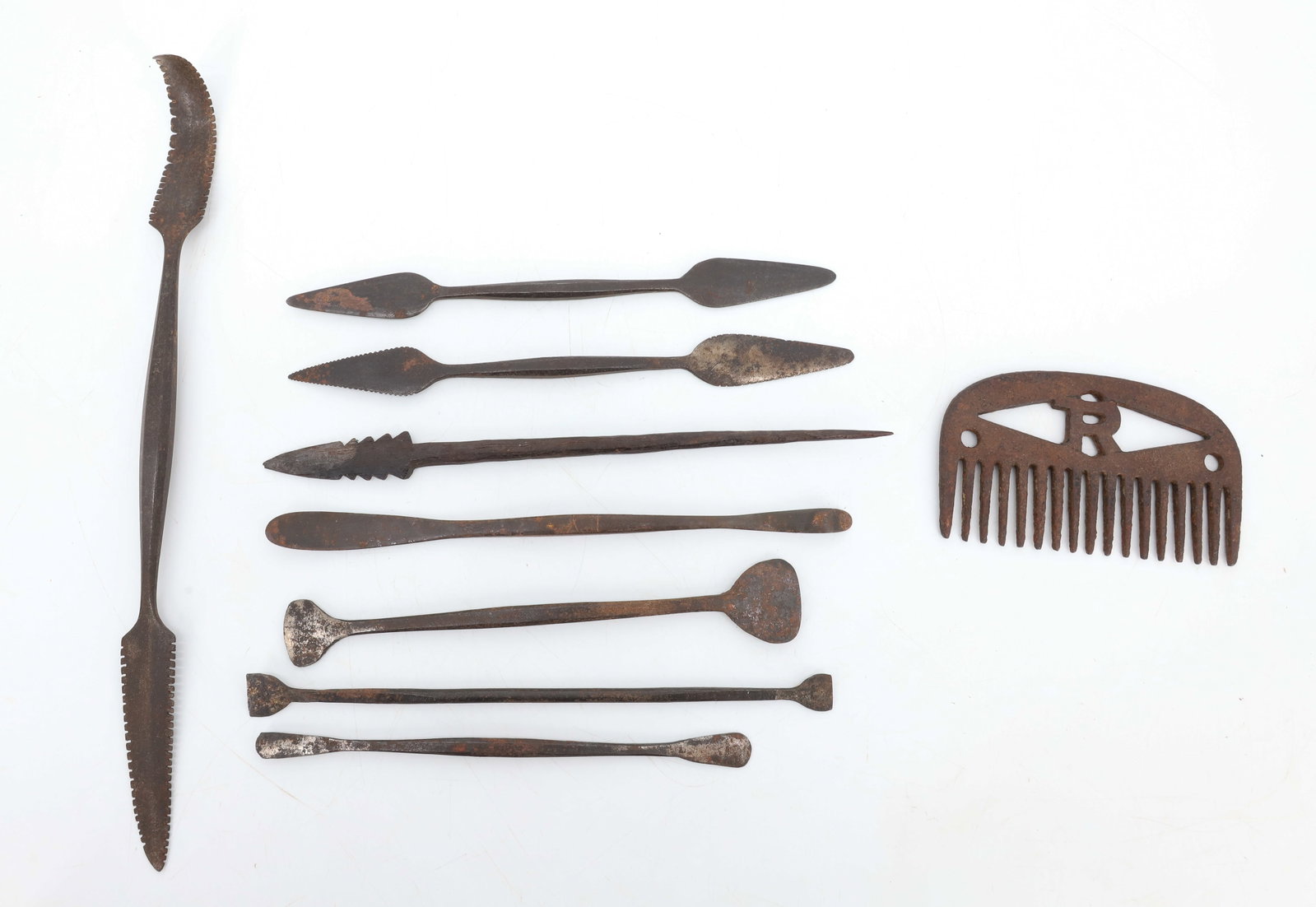 LOT OF ANTIQUE TOOLS: IRON TOOLS WITH VARIETY OF DIFFERENT ENDS. (POSSIBLY FOUNDRY RELATED). LARGEST 11". UNUSUAL "R" IRON COMB AND WOODEN SPEAR 8 5/8" L. PLEASE READ CAREFULLY BEFORE BIDDING. ALL PAYMENTS MUST BE MADE BEF