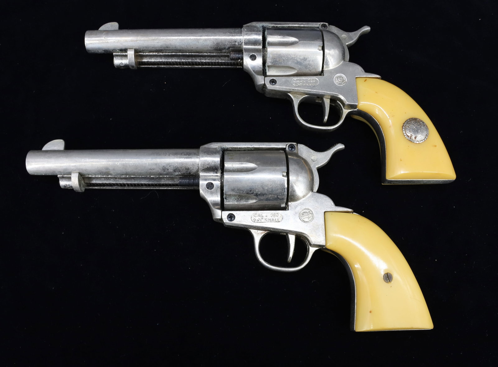 PAIR OF PROP (REPLICA) GUNS: TWO "ME RANGER, MADE IN ITALY" CAL. 380. 10 1/2" TOTAL SIZE. PLEASE READ CAREFULLY BEFORE BIDDING. ALL PAYMENTS MUST BE MADE BEFORE ITEMS CAN BE SHIPPED. BUYERS CAN PAY VIA LIVE AUCTIONEERS PAYMENT CE