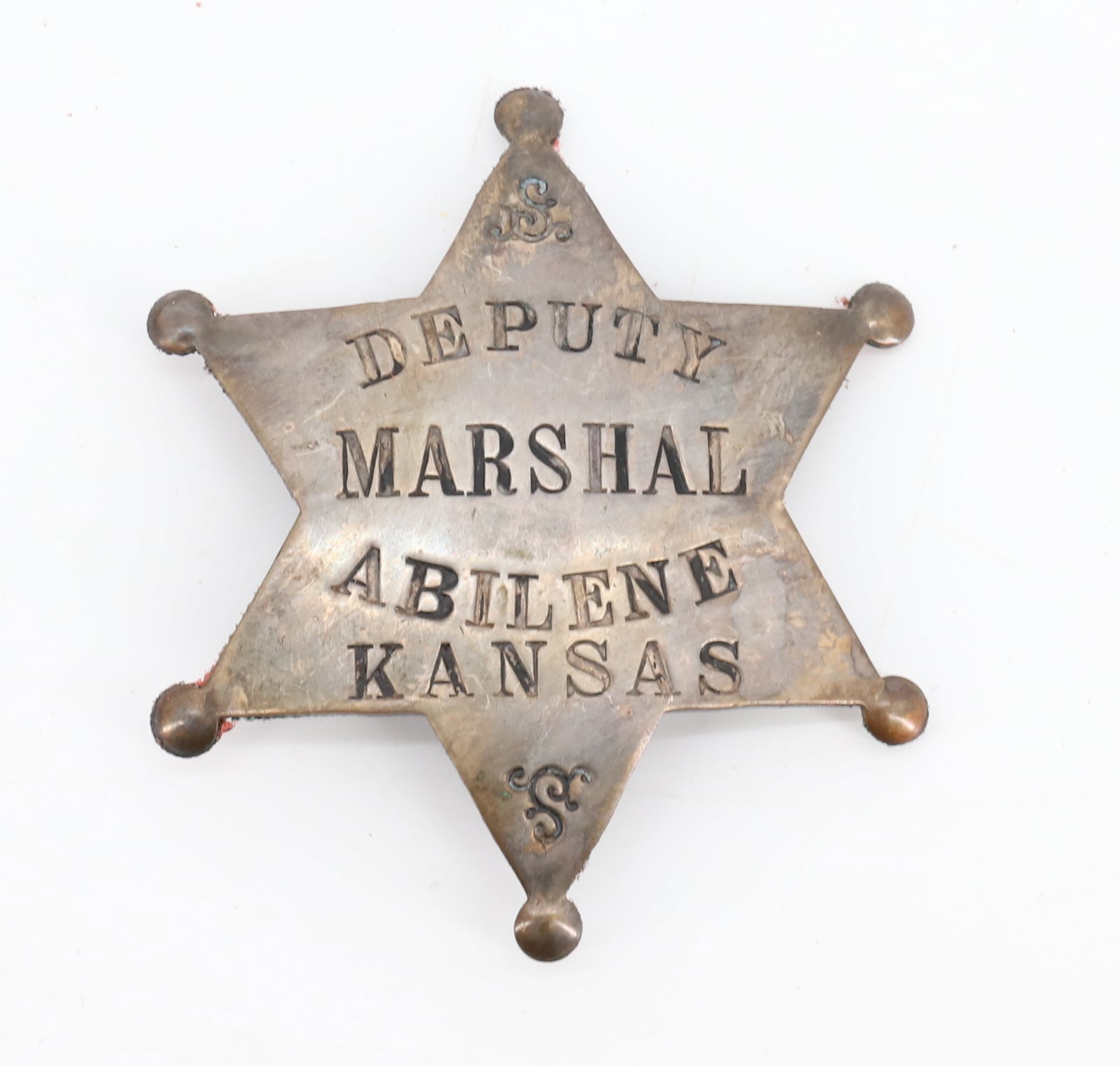 DEPUTY MARSHAL BADGE, KANSAS: SIX-POINT STAR. ABILENE KANSAS. UNMARKED. 2 1/2". PLEASE READ CAREFULLY BEFORE BIDDING. ALL PAYMENTS MUST BE MADE BEFORE ITEMS CAN BE SHIPPED. BUYERS CAN PAY VIA LIVE AUCTIONEERS PAYMENT CENTER IF HAV
