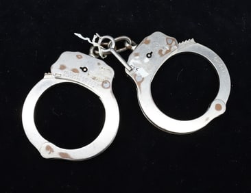 PAIR OF VINTAGE COLT HANDCUFFS