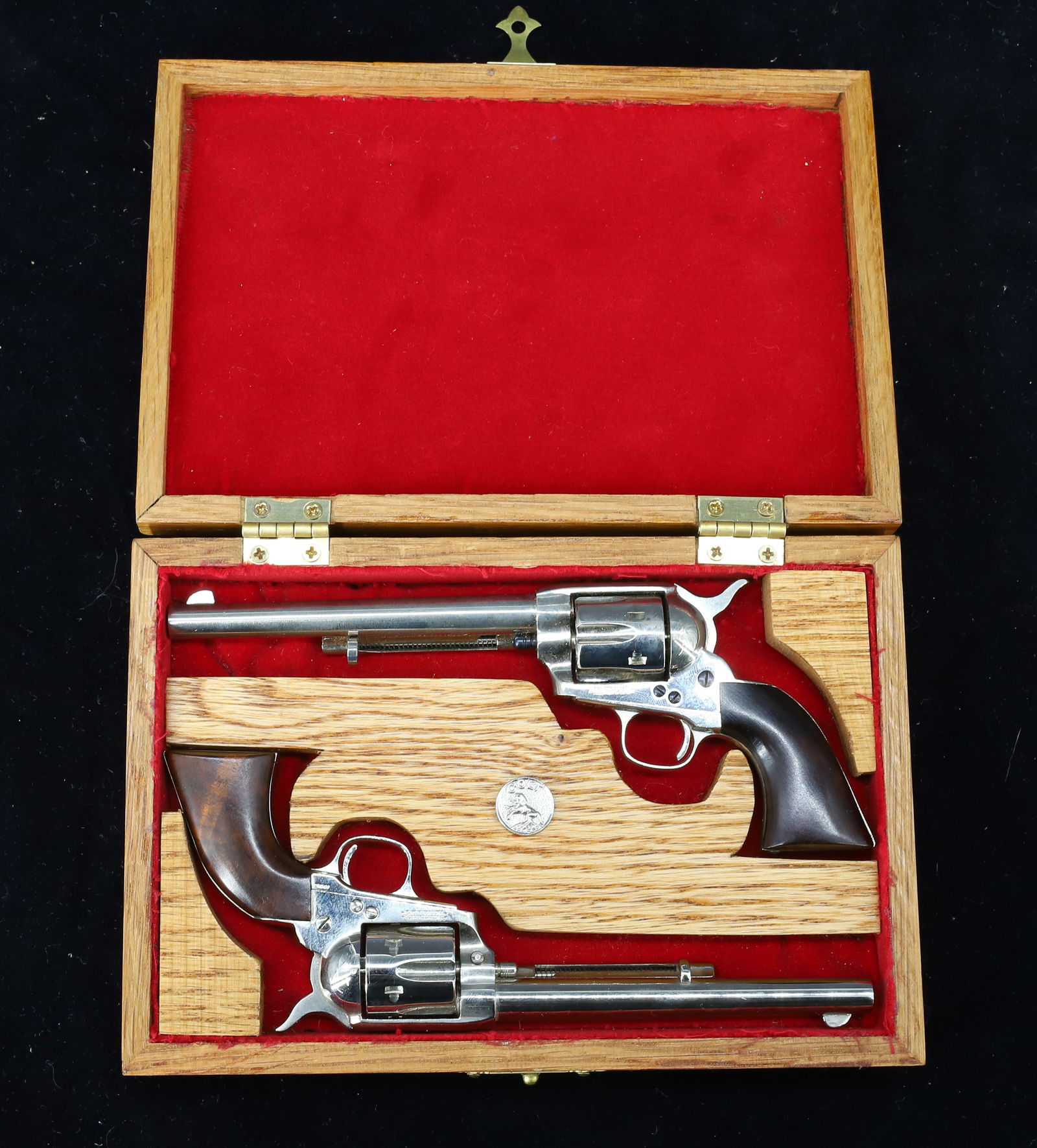 PAIR OF MINIATURE COLT REPLICAS: BOXED SET EACH MRKD. A. UBERTI, ITALY. 45 CAL. PATENT DATES OF 1871/1872. BARRELS 3 1/4" L. PLEASE READ CAREFULLY BEFORE BIDDING. ALL PAYMENTS MUST BE MADE BEFORE ITEMS CAN BE SHIPPED. BUYERS CAN PAY