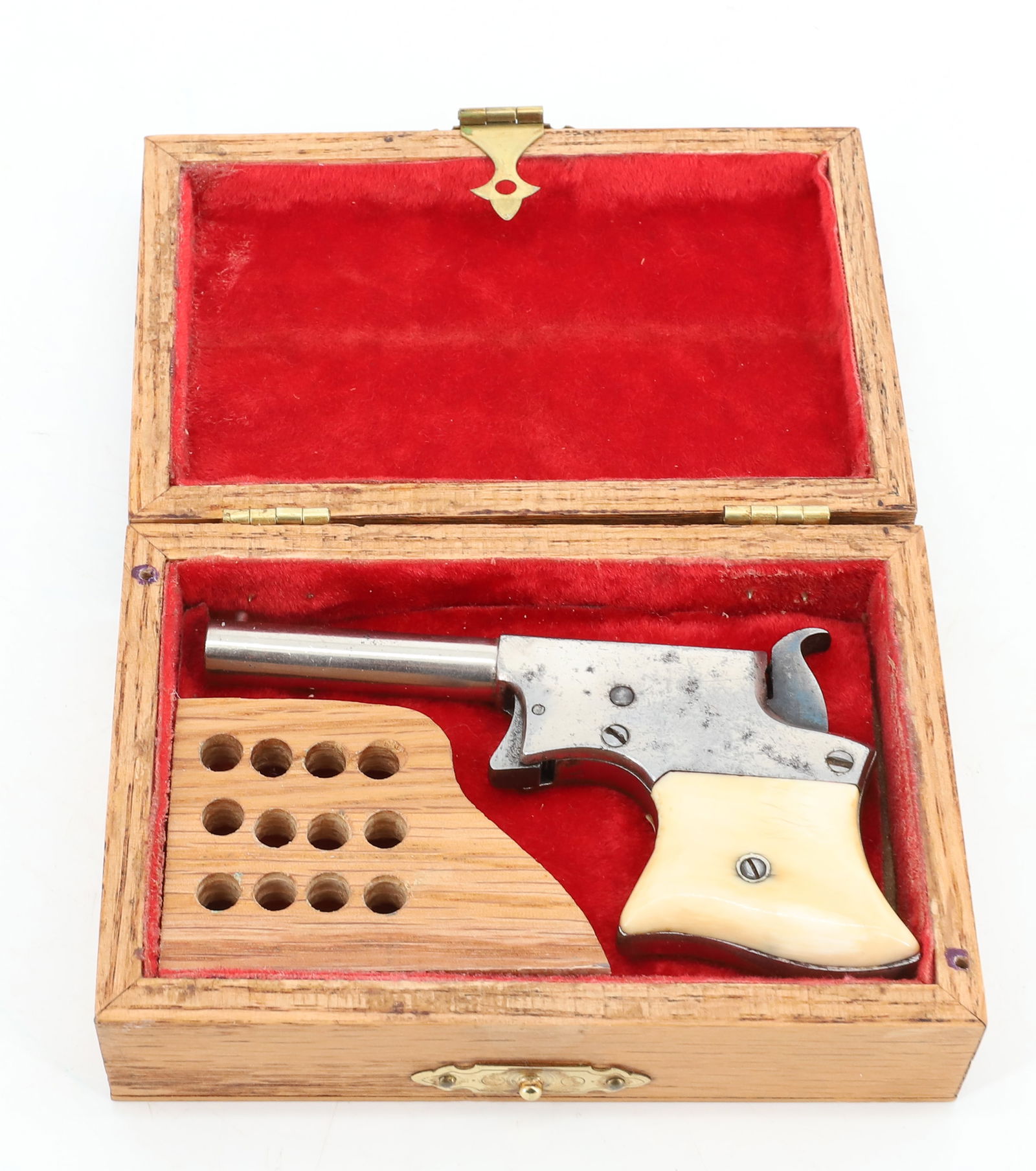 REMINGTON VEST POCKET PISTOL: 22 RF, SERIAL# NA, 3 1/4" BARREL, IN WOODEN BOX - BONE GRIPS ANTIQUE OR BLACK POWDER, NO REGISTRATION OR TRANSFER REQUIRED PLEASE READ CAREFULLY BEFORE BIDDING. ALL PAYMENTS MUST BE MADE BEFORE ITEMS