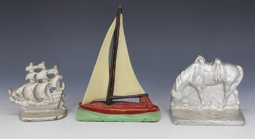 (3) CAST IRON BOOKENDS