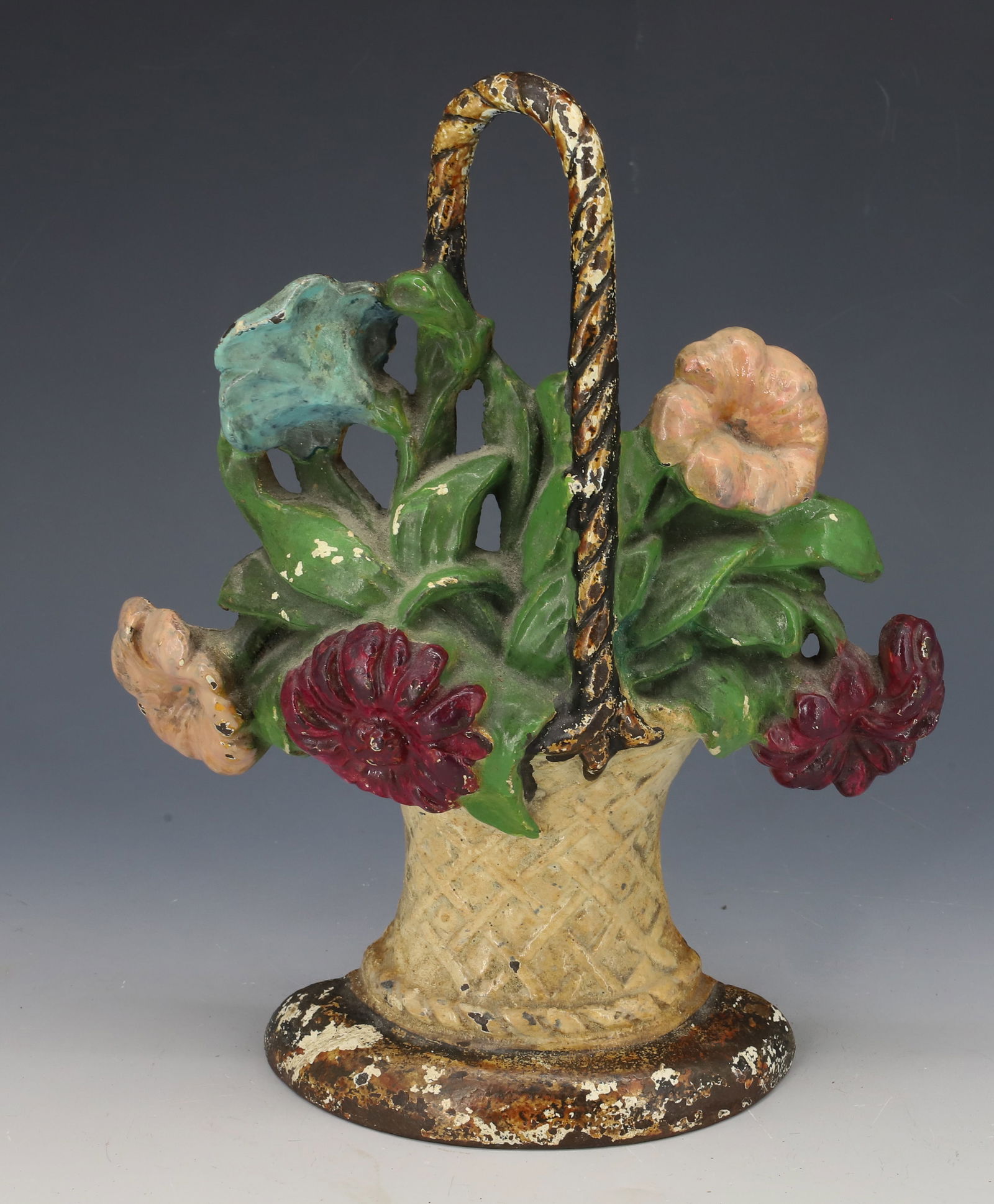 CAST IRON FLOWER BASKET DOORSTOP : PAINTED FLOWERS IN WOVEN BASKET - 9 3/4" PLEASE READ CAREFULLY - Terms for Purchasing and Shipping of Auction Items. Please read carefully before bidding. All payments for purchases will be made throu