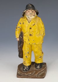 CAST IRON FISHERMAN DOOR STOP 