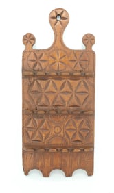 ELABORATELY CARVED SPOON HOLDER