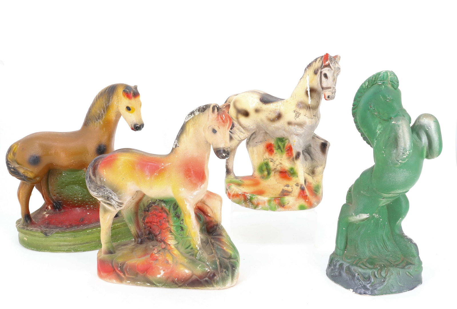 LOT OF CARNIVAL CHALKWARE: (4) HORSES IN VARIOUS POSES. TALLEST 12" H. PLEASE READ CAREFULLY - Terms for Purchasing and Shipping of Auction Items. Please read carefully before bidding. All payments for purchases will be made th