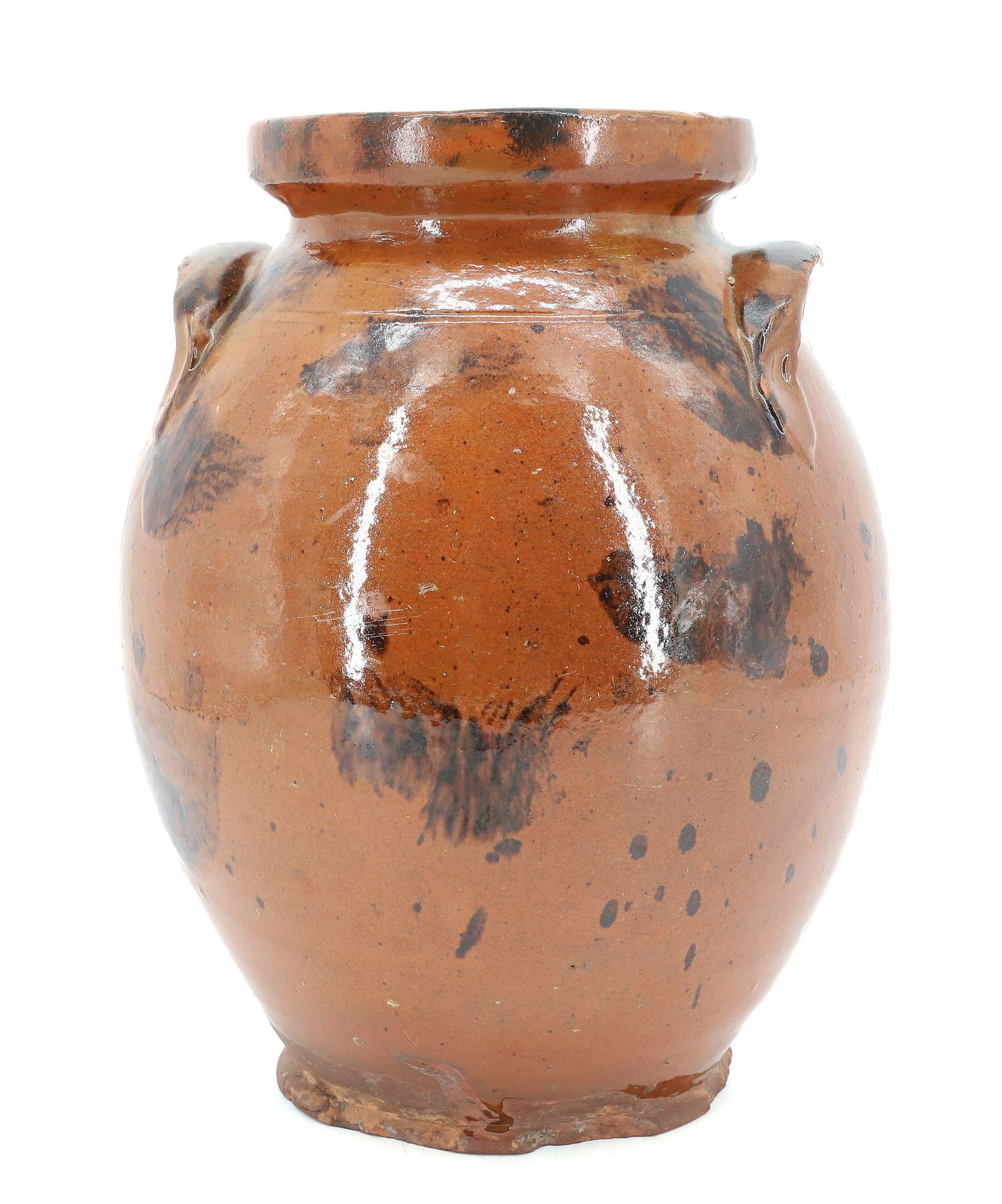 DECORATED REDWARE POTTERY JAR: ORANGE WITH BROWN SPLOTCHES. OVOID SHAPE WITH LUG HANDLES. 9 3/4" H. PLEASE READ CAREFULLY - Terms for Purchasing and Shipping of Auction Items. Please read carefully before bidding. All payments for