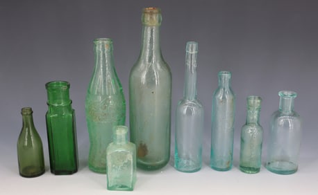 LOT OF AQUA AND GREEN BOTTLES