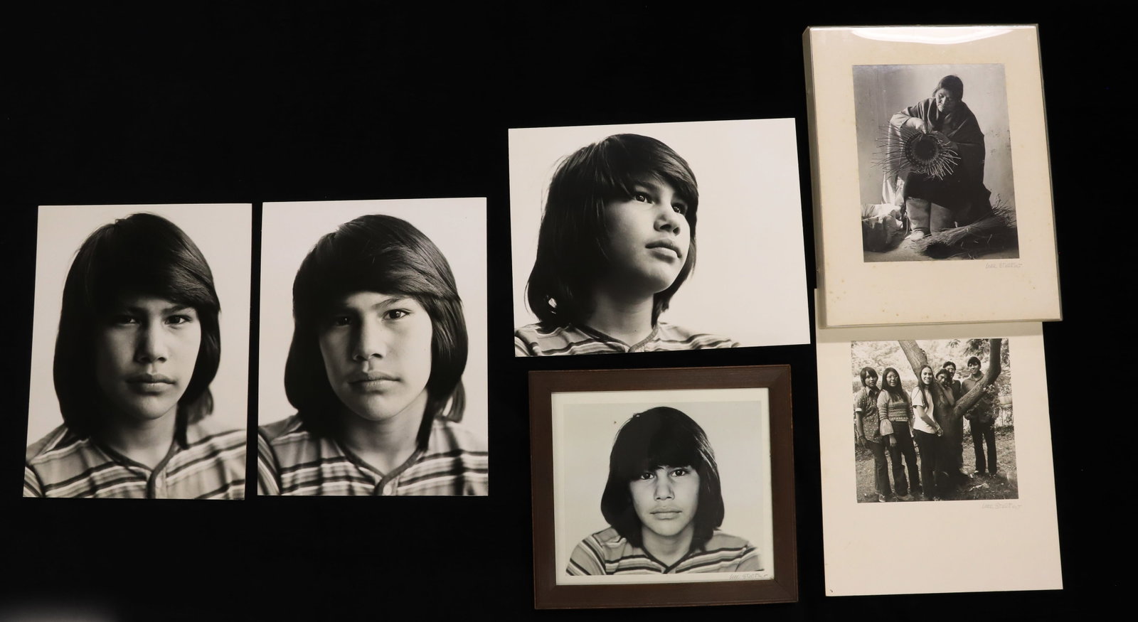 LOT OF NATIVE AMERICAN PHOTOGRAPHS: (6) VARIOUS PHOTOS OF YOUNG BOY, FAMILY, AND OLDER WOMAN WEAVING 9 1/4" X 7 1/4" SIGHT VIEW. LARGEST 13 3/4" X 10 1/2". SGND. IN PENCIL. PLEASE READ CAREFULLY - Terms for Purchasing and Shipping of Au