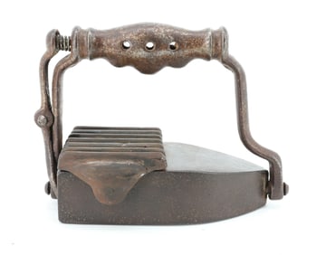 ANTIQUE REVOLVING IRON