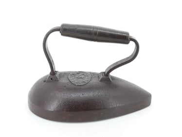 UNUSUAL TEARDROP FLAT IRON