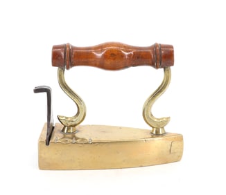 ANTIQUE BRASS SLUG IRON