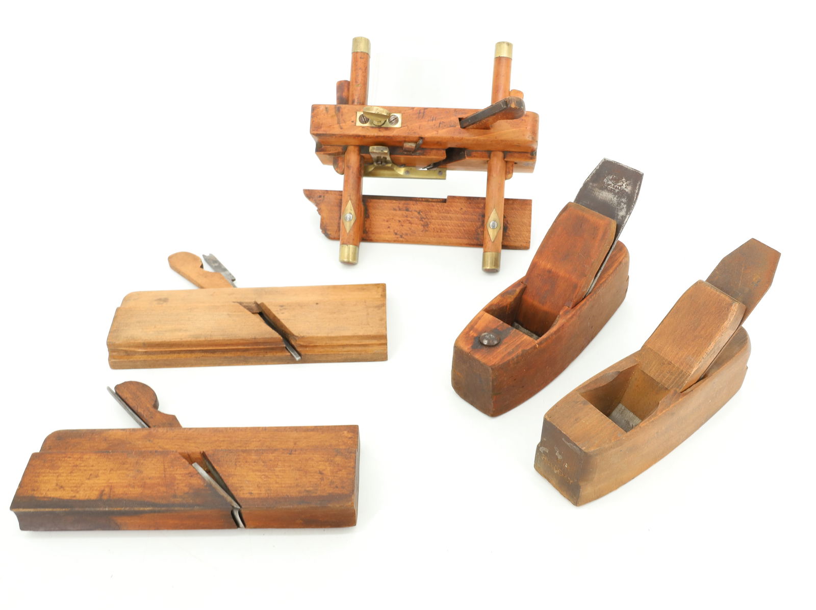 LOT OF ANTIQUE WOODEN PLANES: (5) VARIOUS WOODEN PLANES. ONE WITH BRASS ACCENTS. LARGEST 9 1/2" L. PLEASE READ CAREFULLY - Terms for Purchasing and Shipping of Auction Items. Please read carefully before bidding. All payments for