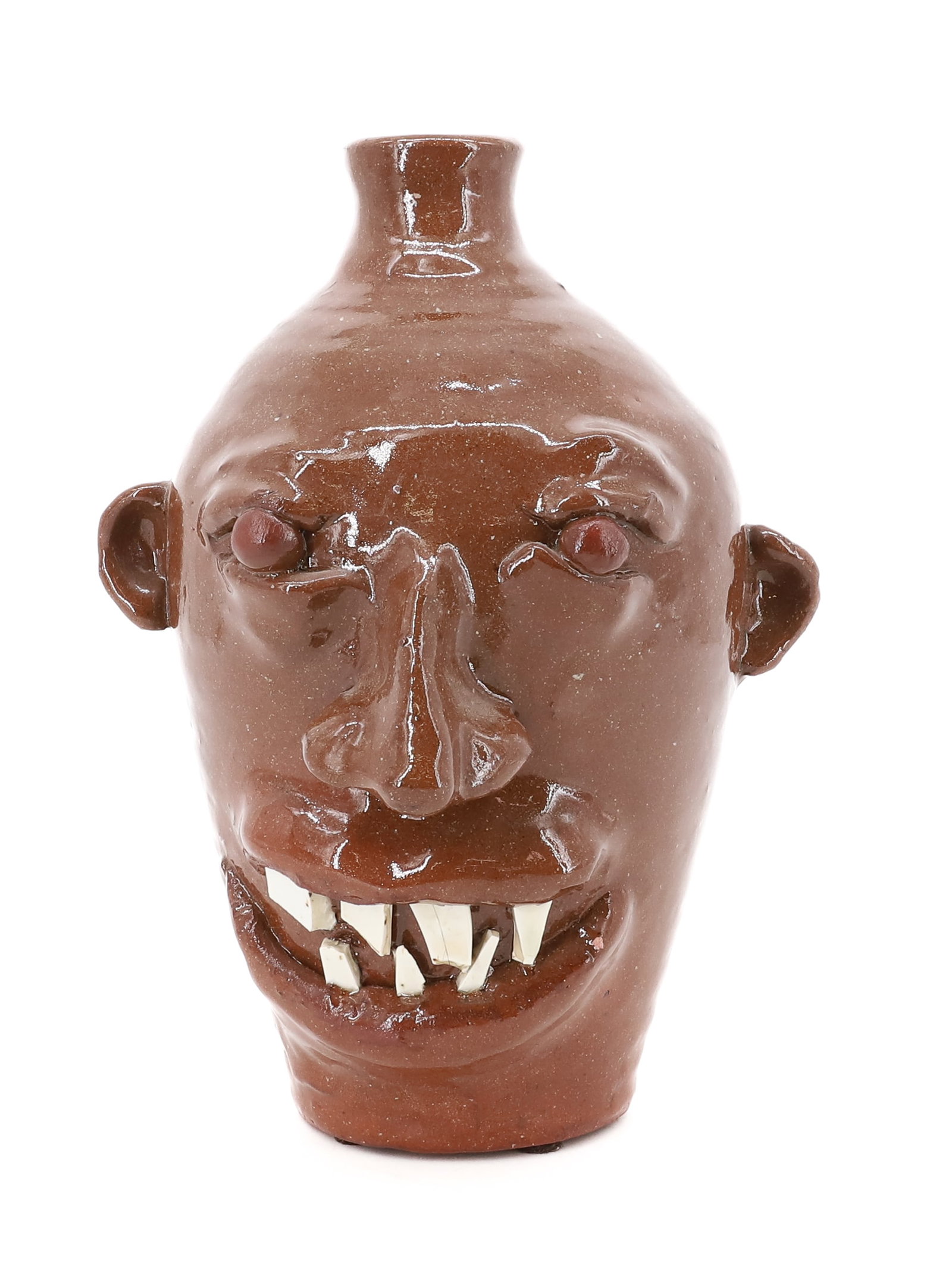 ROGER HICKS POTTERY FACE JUG: BROWN GLAZE WITH APPLIED WHITE TEETH SHARDS, MARKED ON BOTTOM " HICKS 2 - 76" - 8 1/4" H PLEASE READ CAREFULLY - Terms for Purchasing and Shipping of Auction Items. Please read carefully before biddin