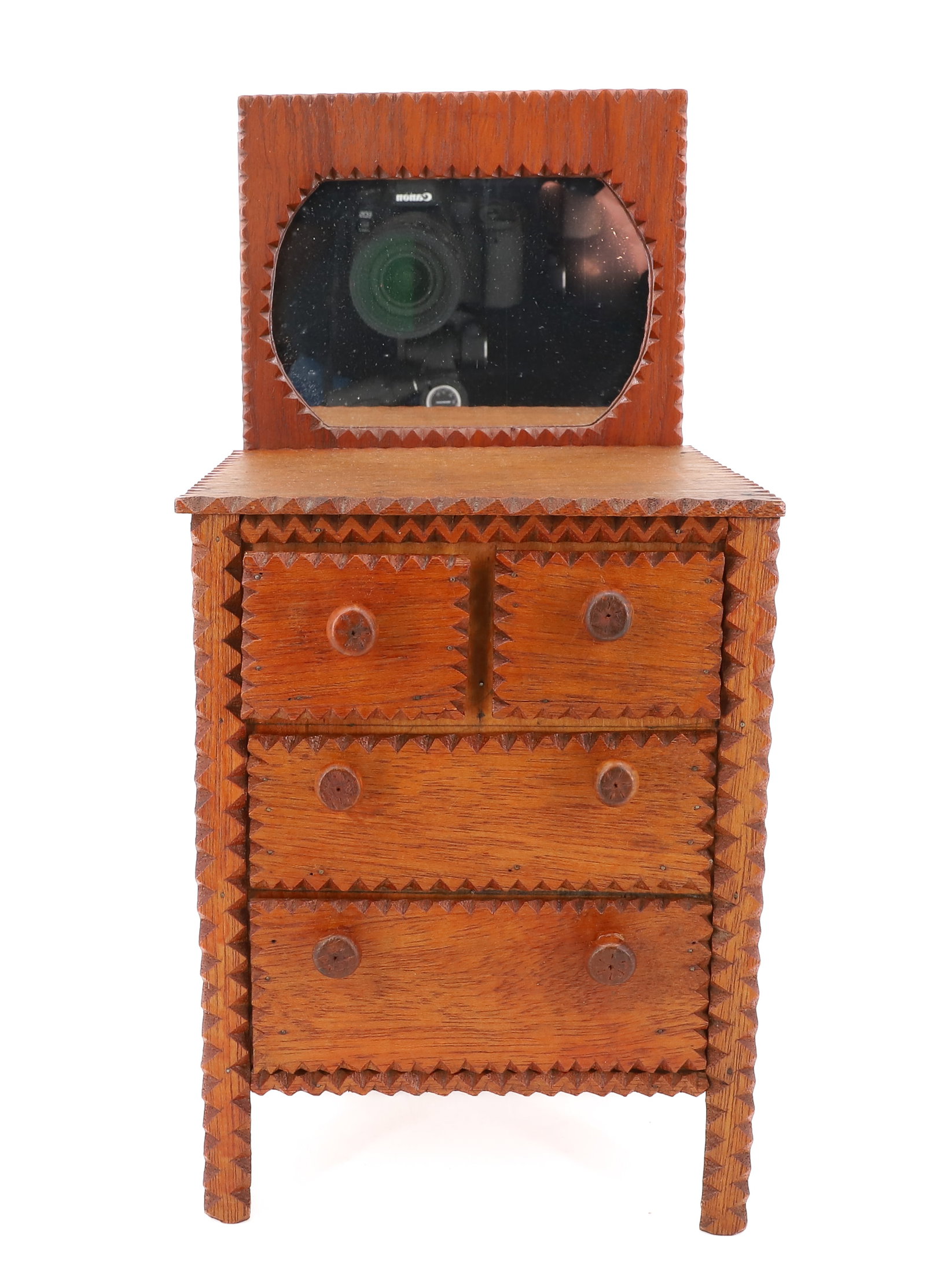TRAMP ART MINIATURE DRESSER: CHIP CARVED EDGES. MIRROR OVER FOUR DRAWERS. NATURAL FINISH. 14 1/2" X 7" X 7 1/4". HEART MOTIF ON SIDES. PLEASE READ CAREFULLY - Terms for Purchasing and Shipping of Auction Items. Please read carefu