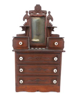 FOLK ART MINIATURE DRESSER: VICTORIAN-STYLE WITH TWO SMALL DRAWERS ON EITHER SIDE OF MIRROR OVER THREE LARGER DRAWERS. WHITE PORCELAIN KNOBS. MADE FROM CIGAR BOXES. 19 1/4" X 10 1/2" X 6". PLEASE READ CAREFULLY - Terms for Purch