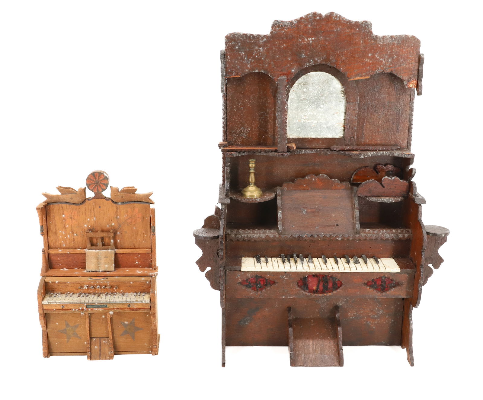 (2) FOLK ART MINIATURE PUMP ORGANS: SMALLER HAS STAR AND FLORAL MOTIF WITH BIRDS AT TOP. 8" X 5" X 2". LARGER HAS DARK FINISH WITH CHIP CARVED EDGES. TAG ON BACK 1904. 14 1/2" X 10 1/2" X 4". MADE FROM CRATES. PLEASE READ CAREFULLY - Te