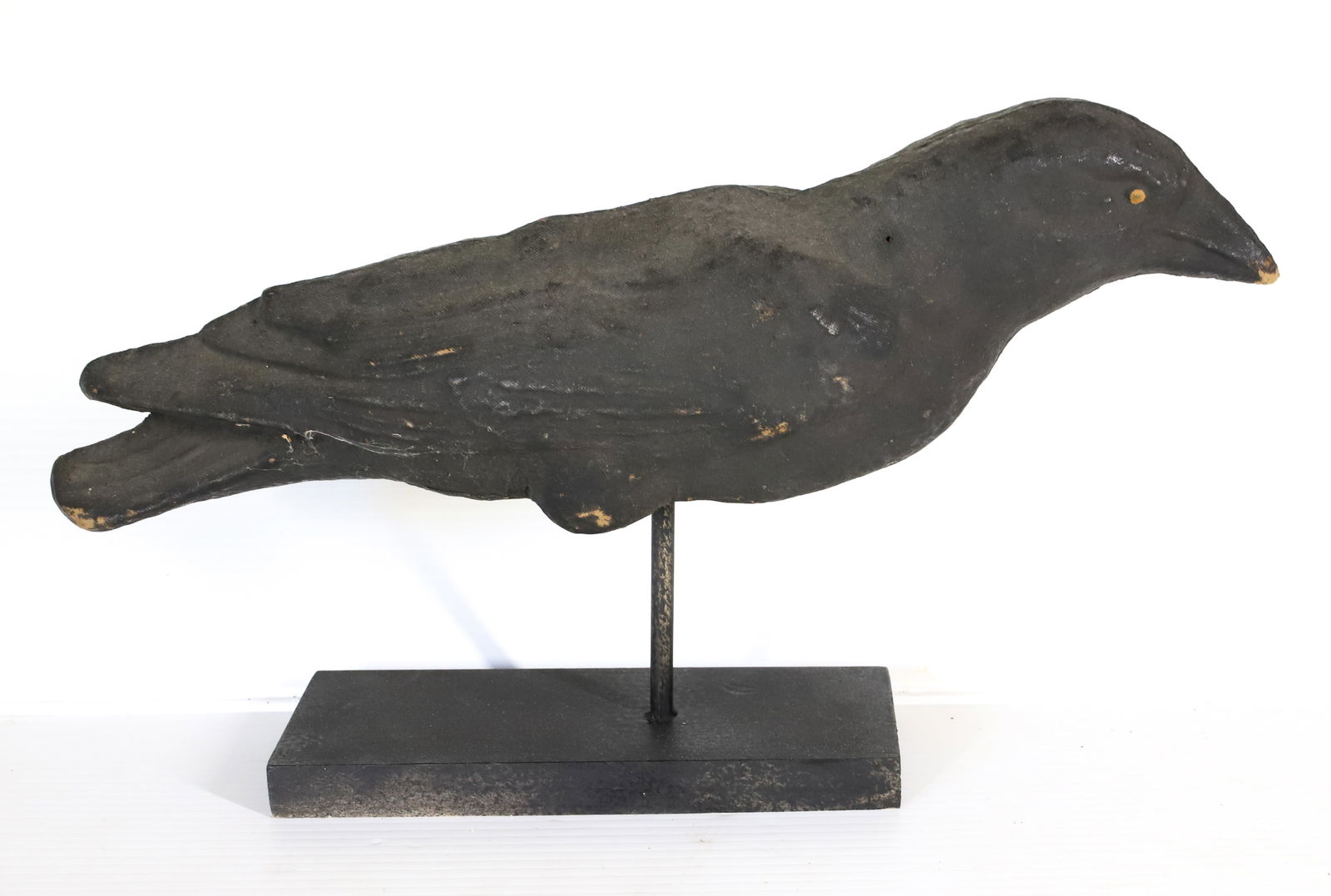 PAPIER-MACHE CROW DECOY: HOLLOW BODY. BLACK SURFACE. ON DISPLAY STAND. 16" L. PLEASE READ CAREFULLY â€“ THIS IS AN IN-PERSON & ON-LINE AUCTION. SALE IS LOCATED IN HARMONY TOWNSHIP, PHILLIPSBURG, NJ âS