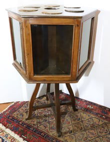 GLASS SIDED REVOLVING DISPLAY CASE