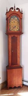 ANTIQUE TIGER MAPLE TALL CASE CLOCK: 8 DAY CLOCK WITH FANCY TIGER MAPLE CASE, BROKEN ARCH SCROLL TOP, AND FRENCH FEET - MODERN PAINTED CLOCK FACE WITH MOON PHASE DIAL, AMERICAN FLAG, EAGLE, AND PILGRIMS - 98" X 19" X 10" WEIGHTS, PENDULU