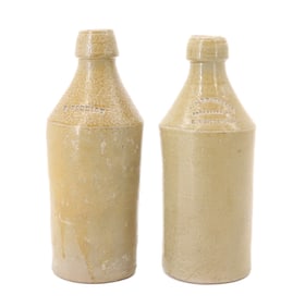(2) STONEWARE ADVERTISING BOTTLES