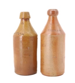 (2) STONEWARE ADVERTISING BOTTLES